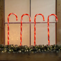 Set of 4 62cm Red and White Candy Cane Stake Path Finder Lights