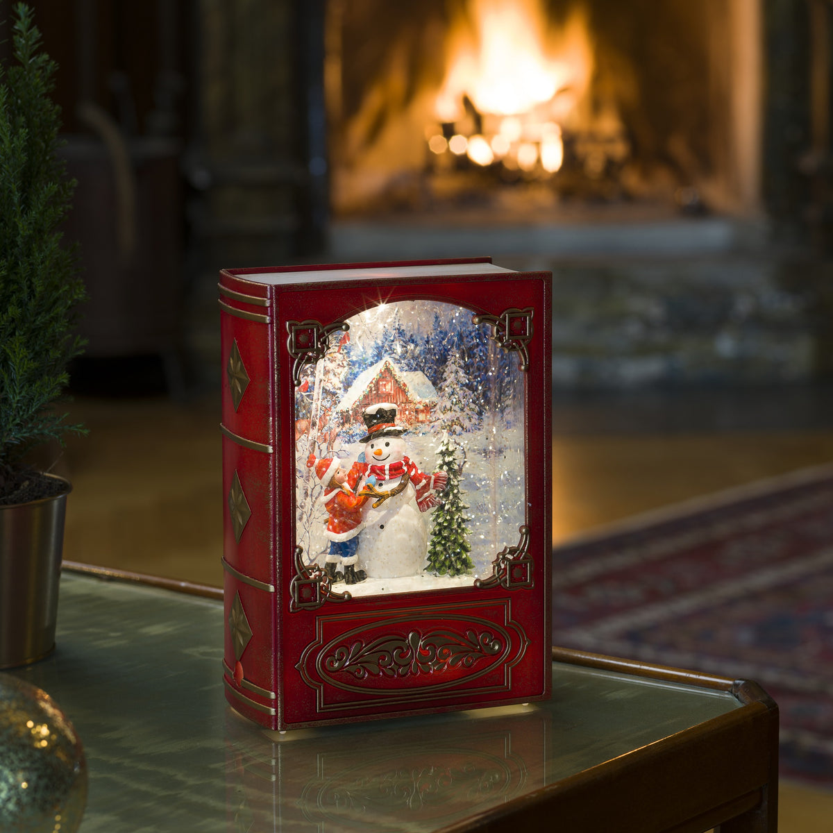 Red Book Magical Water Spinner with Snowman and Child Scene